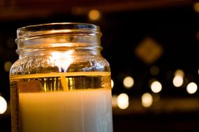 a glass candle in the night