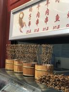 fried scorpions on a stick