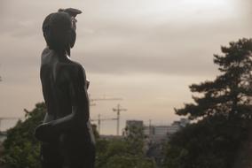 Silhouette of statue at Dawn Sunset