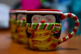 mugs in the form of cute penguins