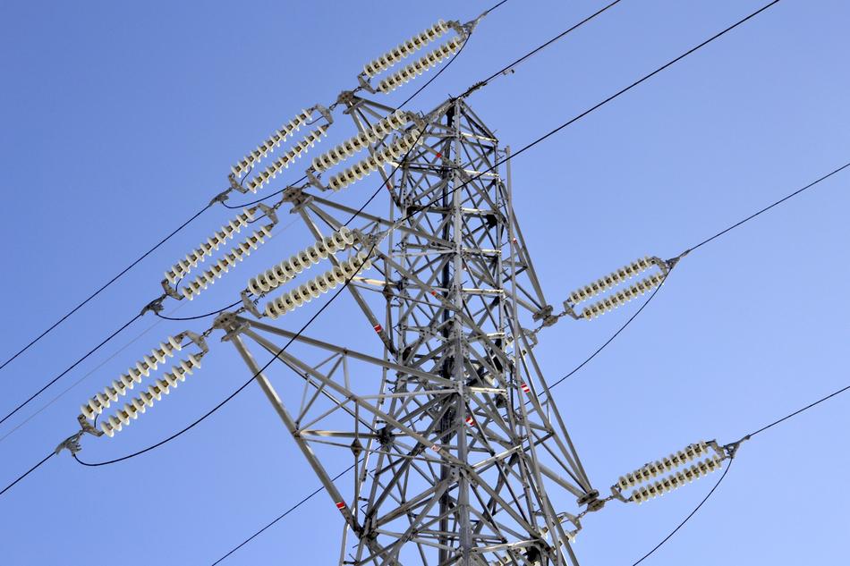 high voltage pillars on a clear day