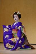 Woman in the beautiful and colorful kimono