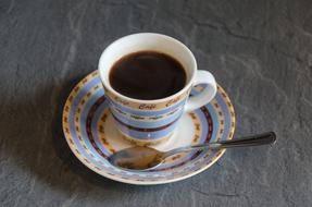 hot bitter coffee in a beautiful mug