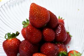 Refreshing strawberries on a plate