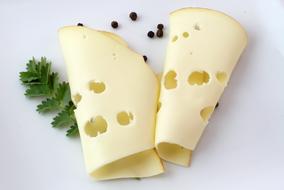 thinly sliced cheese in a hole