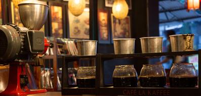 cups with coffee grinder