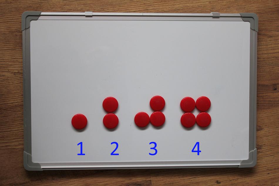 arithmetic on a white magnetic board