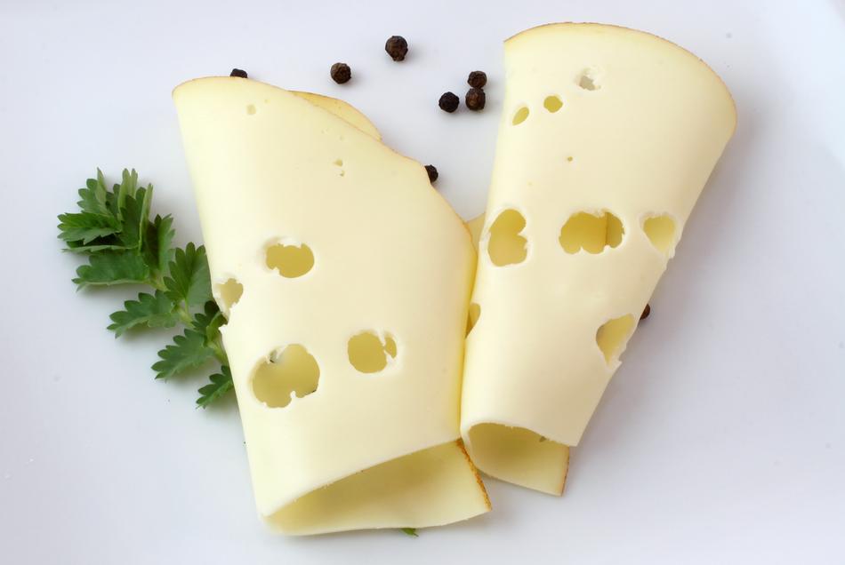 thinly sliced cheese in a hole