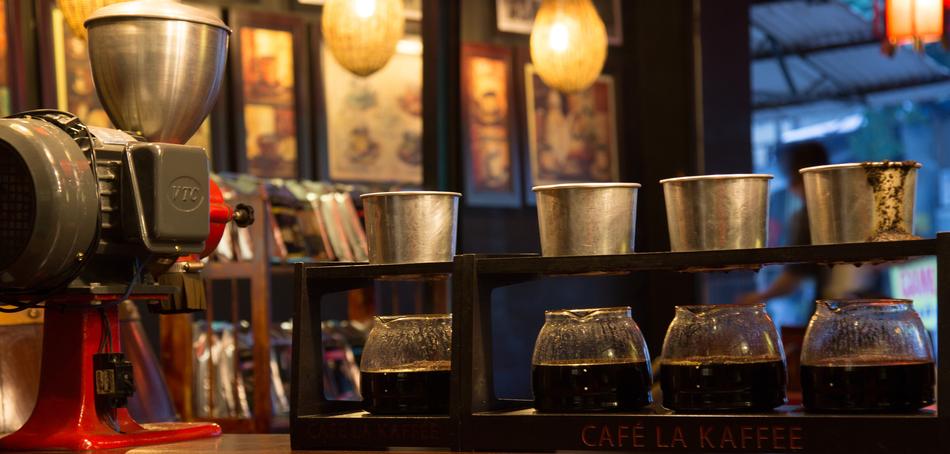 cups with coffee grinder