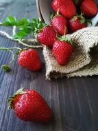 sweet strawberries scattered on the table