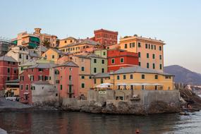 Colorful Houses on coast at evening, Italy, Genoa