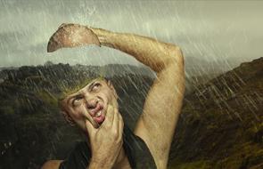 Model of the man taking his head off, at background with the hills, in rain, clipart