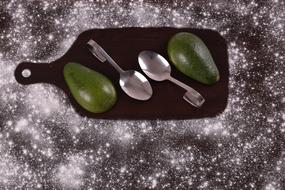 wooden board with avacado