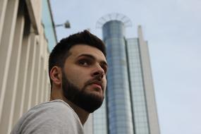 Man and Tower in City