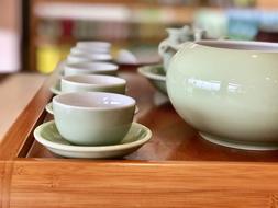 able with ceramic mugs and a kettle