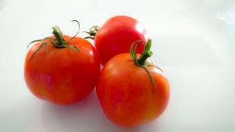 Three large juicy tomatoes