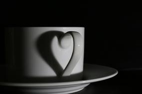 beautiful white mug on a black background
