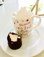 Chocolate cream dessert with a mug