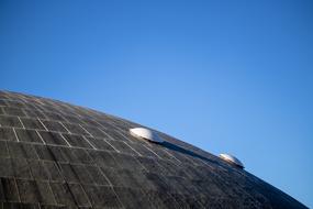 Architecture roof at the background of blue sky