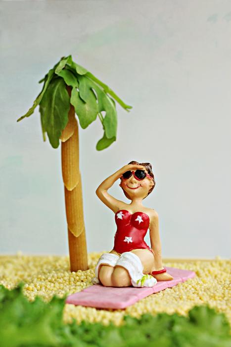 figure of a beautiful girl on the beach