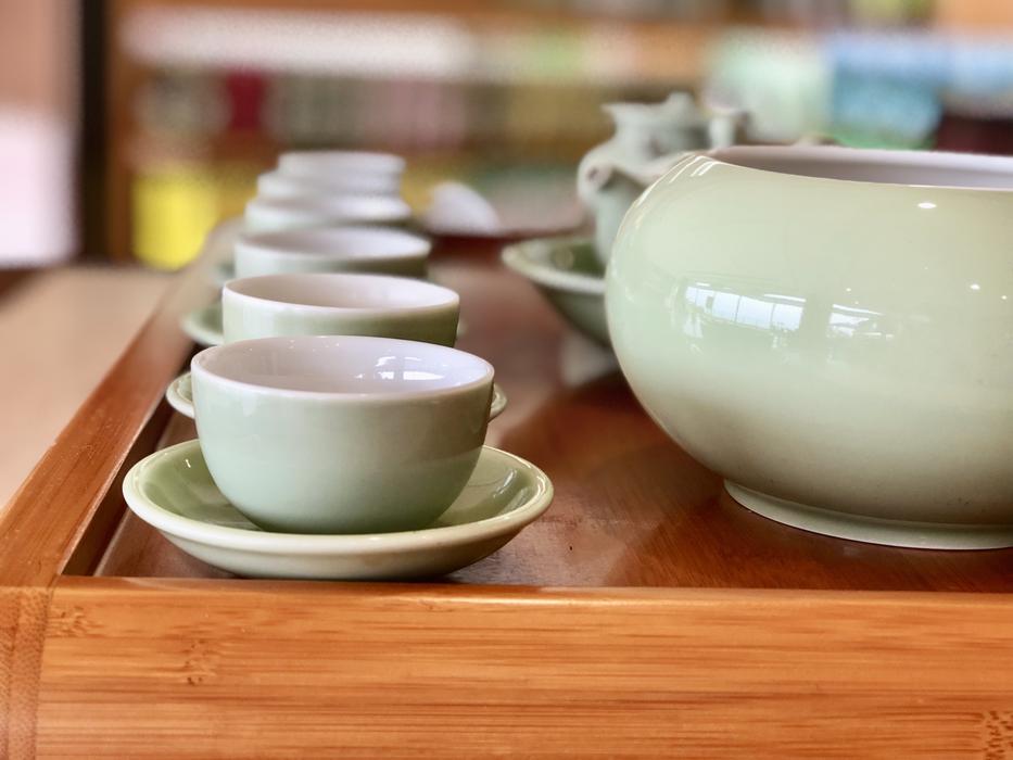 able with ceramic mugs and a kettle