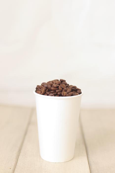 cup filled with coffee beans