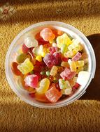 Delicious sugar lollipops in a bowl