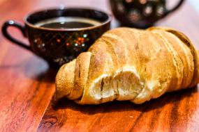 delicious croissant with coffee