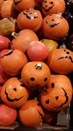 cute pumpkins with holiday faces