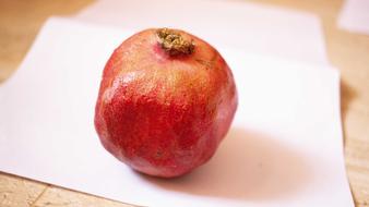 Fresh sweet pomegranate on the table