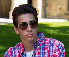 Young Man Contemplating Portrait