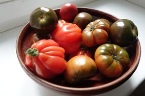 delicious fresh tomatoes on a plate
