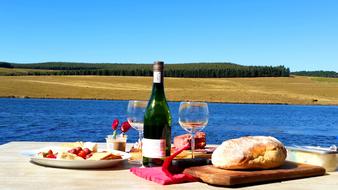 dinner with wine by the river