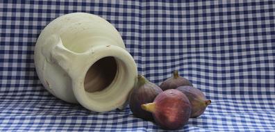 Ceramic white pot with fruit