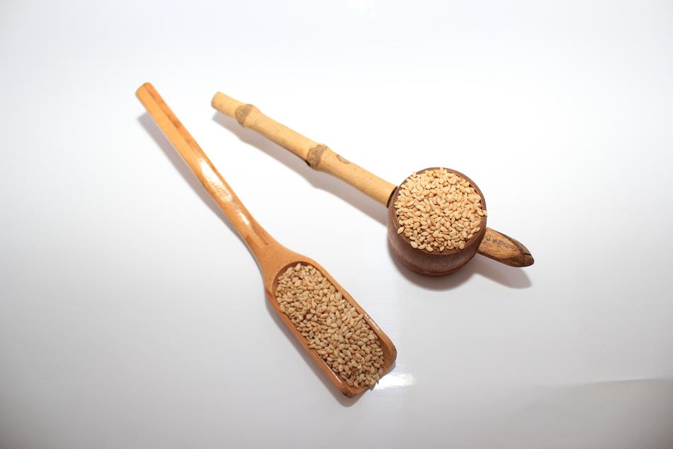 dried seeds in a spoonful