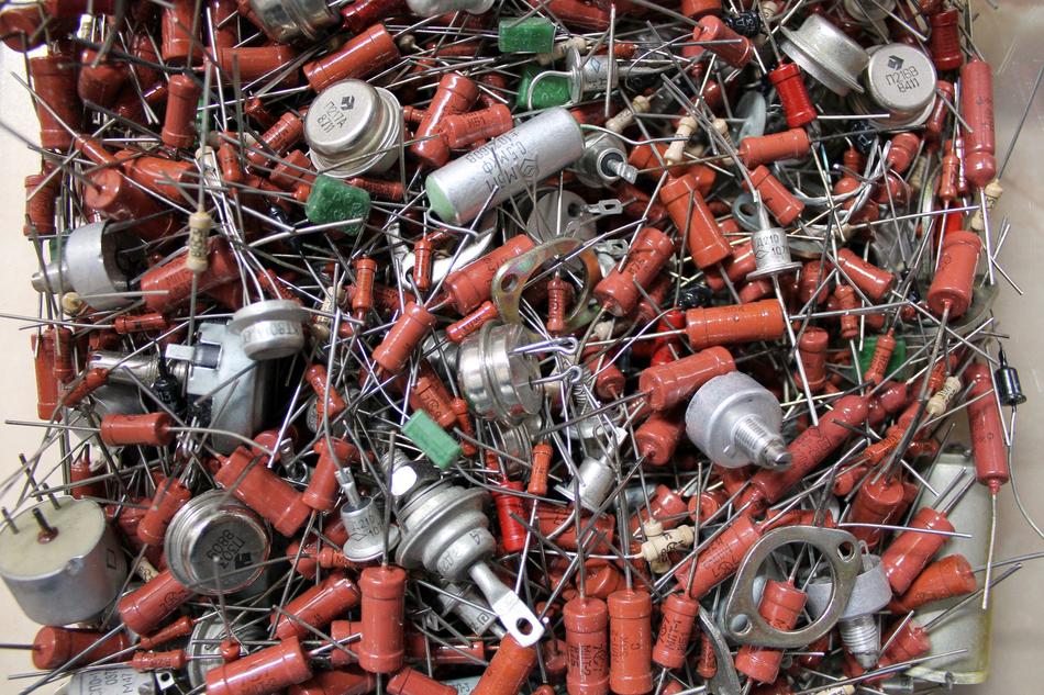 Colorful pile of the vintage electronic resistors, in light