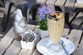 milkshake on a table with flowers