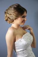 the girl in the wedding dress is beautiful