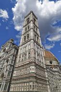 stone tower with a city