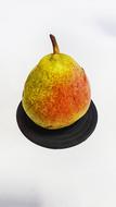 sweet colored pear on a white background