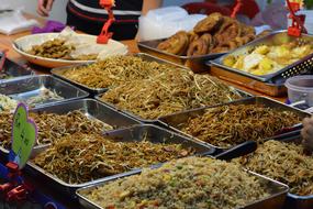 delicious noodles and rice with spices at the fair