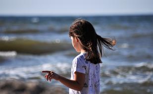 The Little Girl Child on Beach