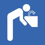image of a man drinking from a faucet