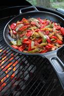 Pan fried vegetables on the fire