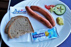 Sausages and bread on the table