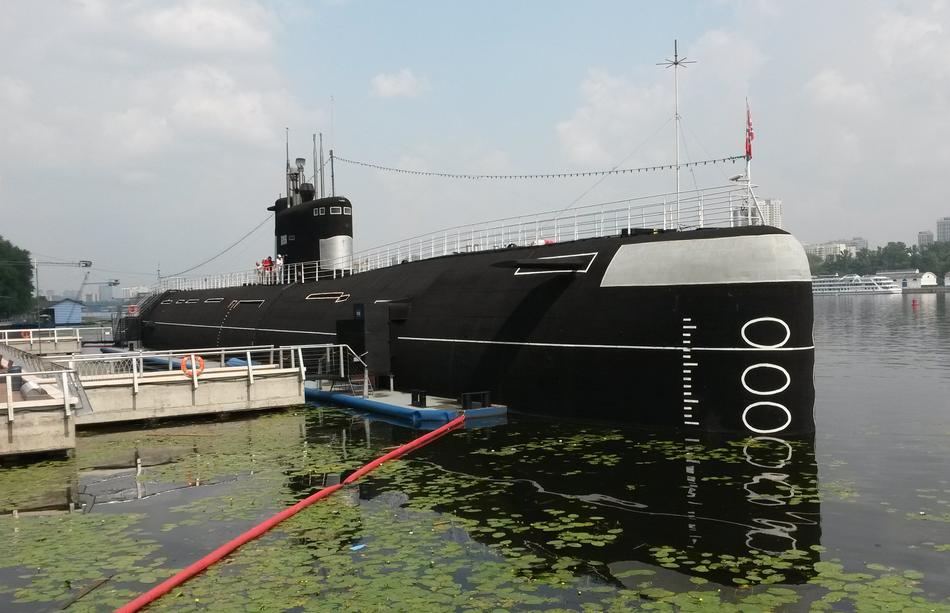 the big black ship on the pier