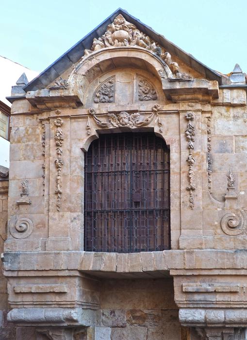 Wooden sashes on the facade of the house