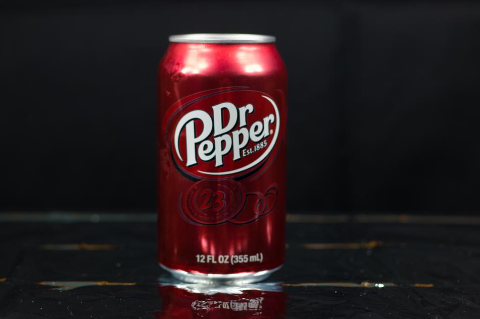 red can of carbonated beverage