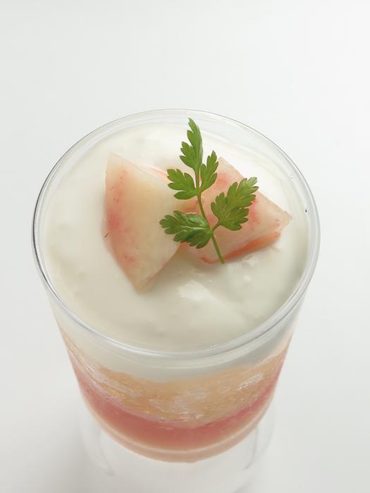 cream dessert with fruit in a glass