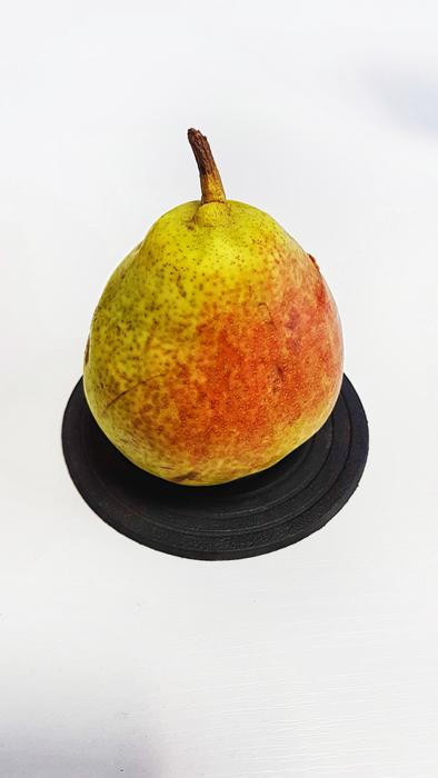 sweet colored pear on a white background